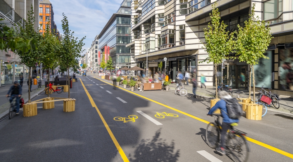 cyclist going down cycle lane on semi-pedestrianised road