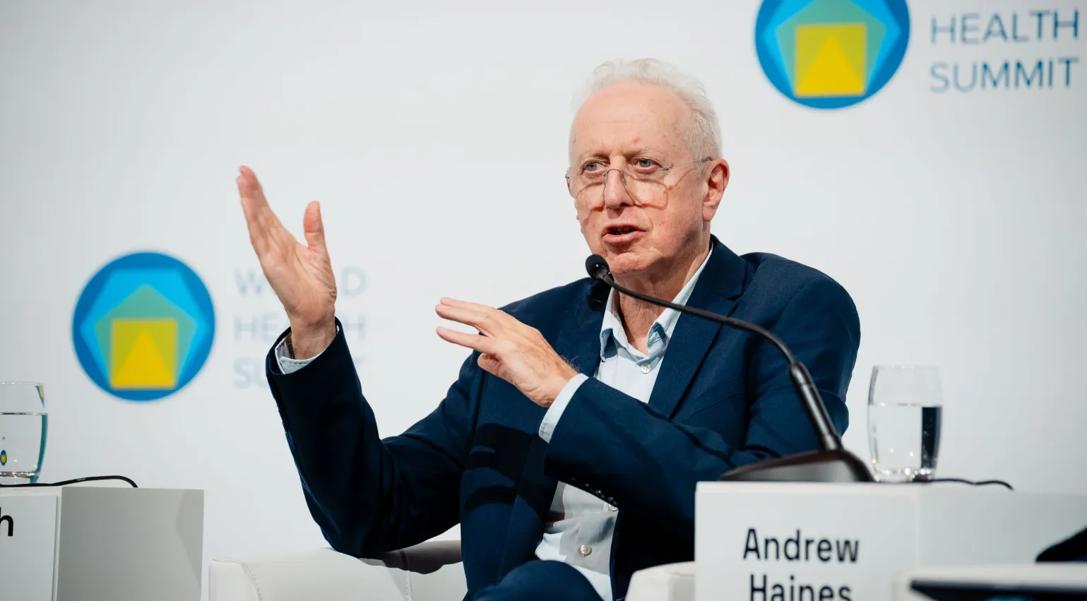 Photograph of Andy Haines speaking at the World Health Summit