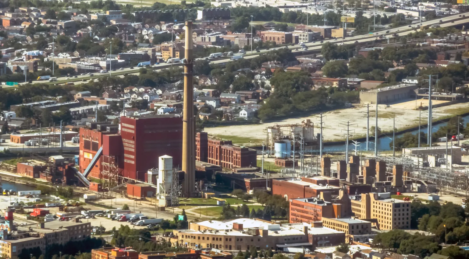 Photograph of a power station with prominent smokestack in Chicago